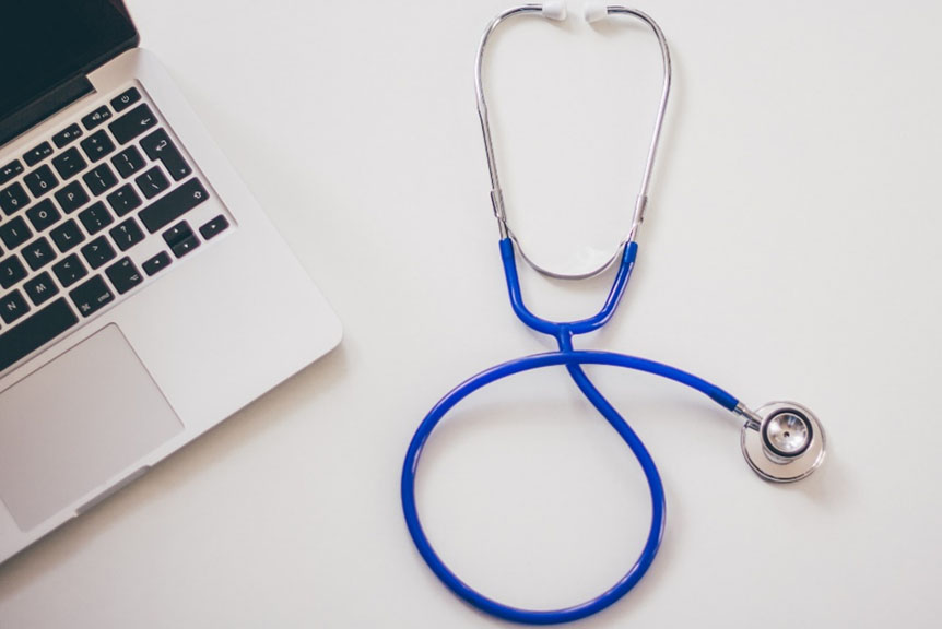 International students accessing NHS through laptop