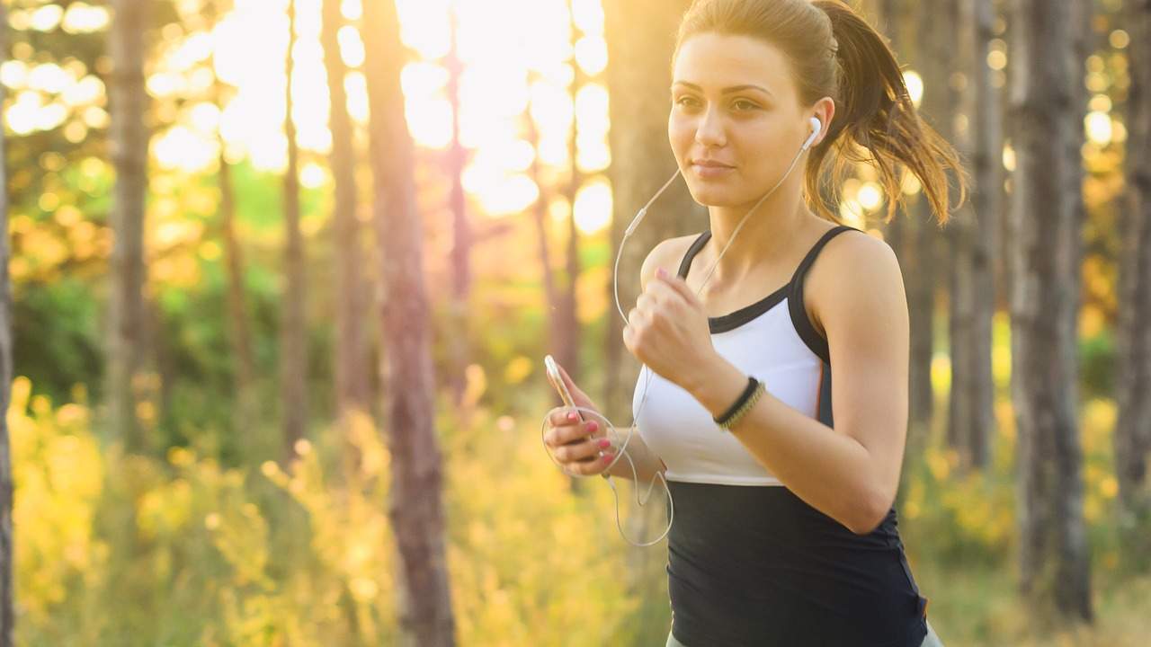 Loughborough student running in woods