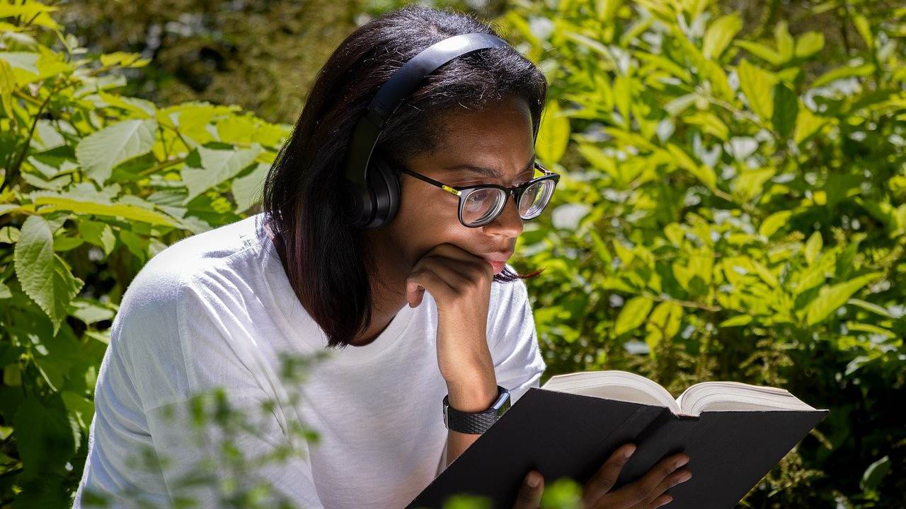 Student at Leicester University reading in nice environment