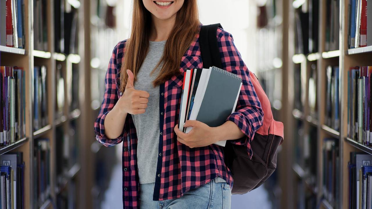 Leicester student in the library