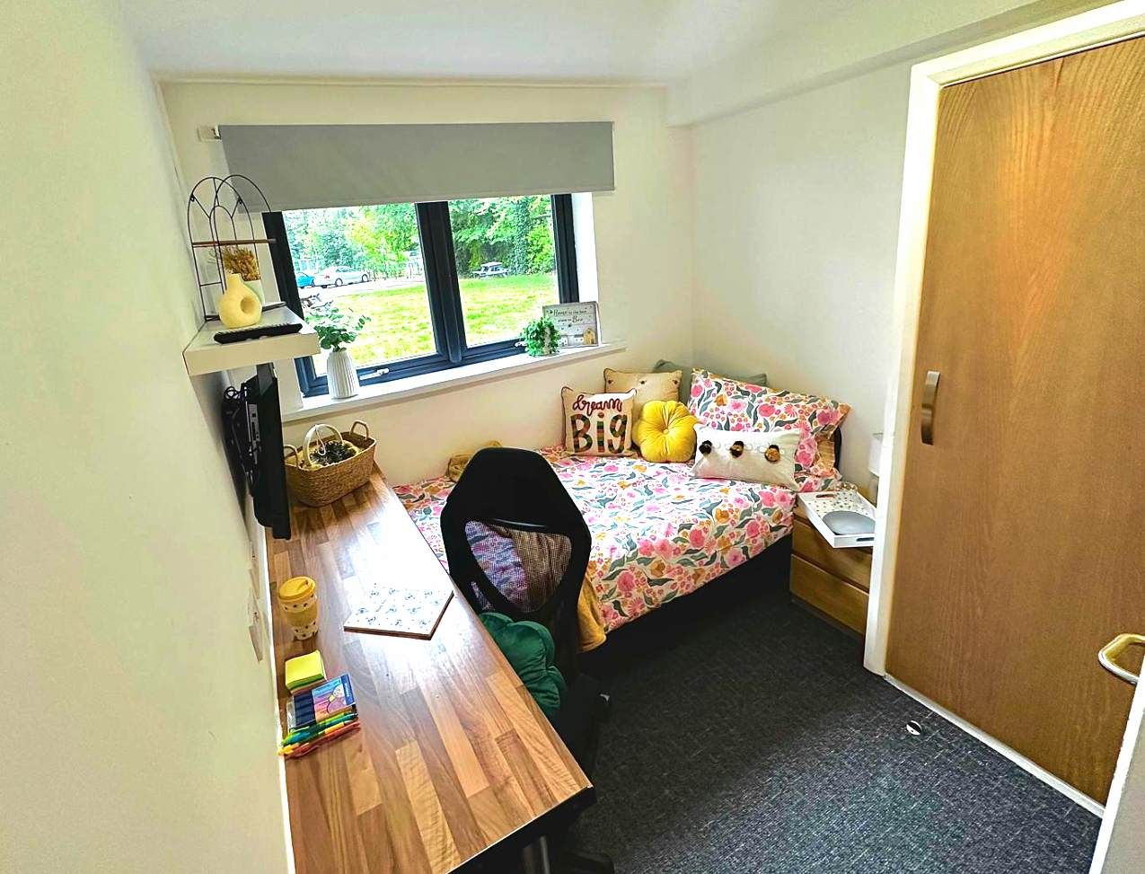 Forest Court Loughborough Student Accommodation Gold single bed with table for student comfort