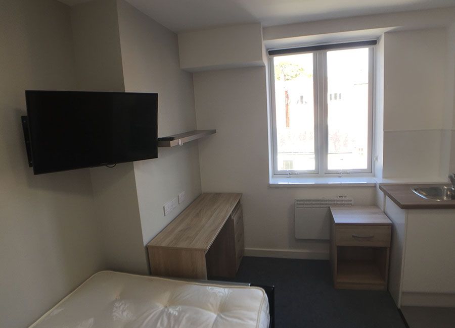 Renaissance House Loughborough Student Accommodation: Standard studio - TV screen on wall