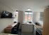 Renaissance House Loughborough Student Accommodation: Standard studio - with large open space with kitchen and desk