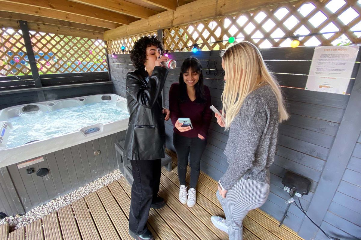 Student Accommodation Loughborough - Jacuzzi with students relaxing 