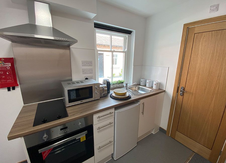 Salisbury Road Leicester Student Accommodation - Full kitchen view with fridge