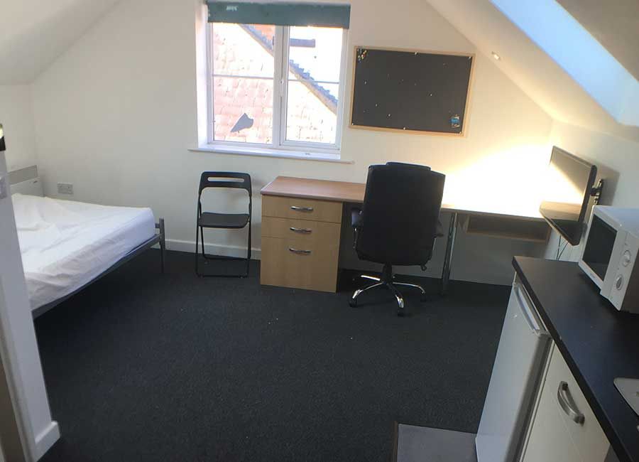 Radmoor House Leicester Student Accommodation - Large Studios - Wide open space with kitchen, bed and desk