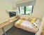 Forest Court Loughborough Student Accommodation ensuite room with desk and TV