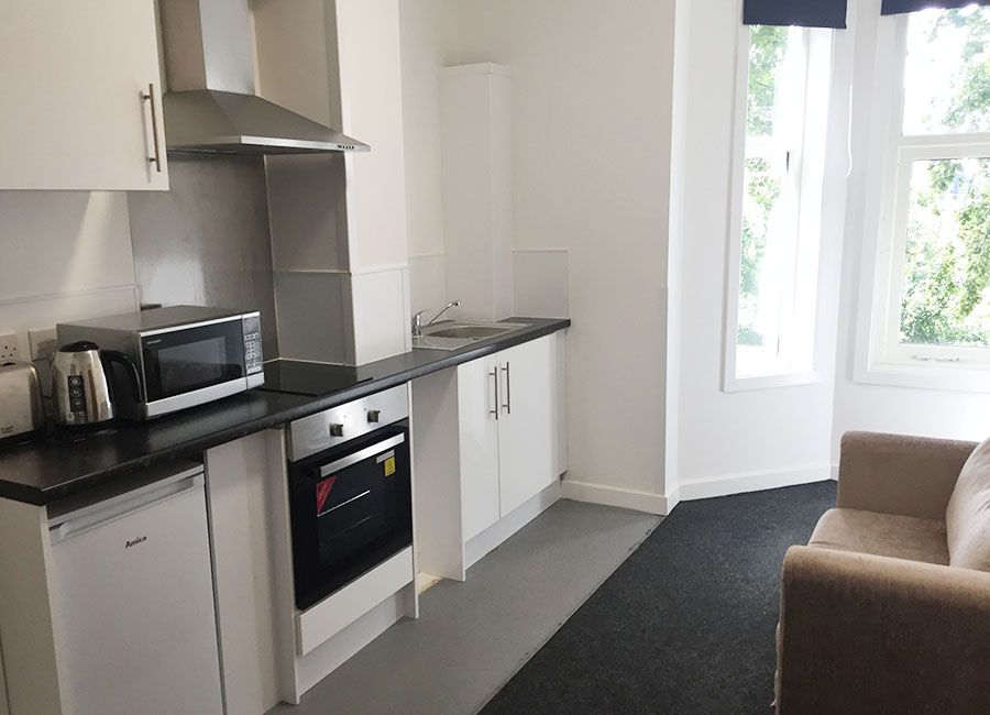 Regent Road Leicester Student Accommodation: Standard Studio - Large fitted kitchen with bright room and large windows
