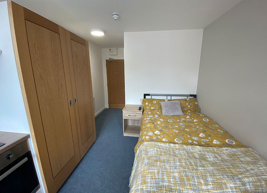 Renaissance House Loughborough Student Accommodation: Standard studio - Double bed and large storage for cloths