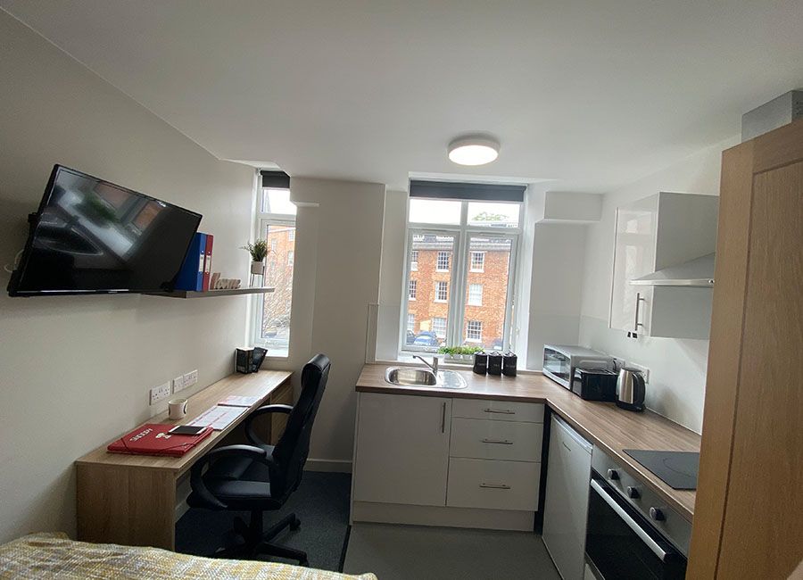 Renaissance House Loughborough Student Accommodation: Standard studio - with large open space with kitchen and desk